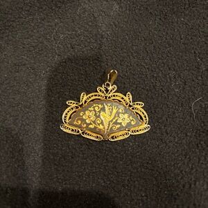 Elegant Gold and Black Pendant